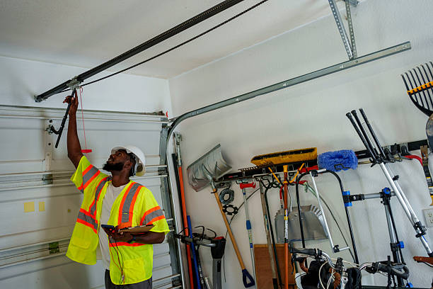 Professional Garage Door Panel Replacement technician working in West Orange, TX